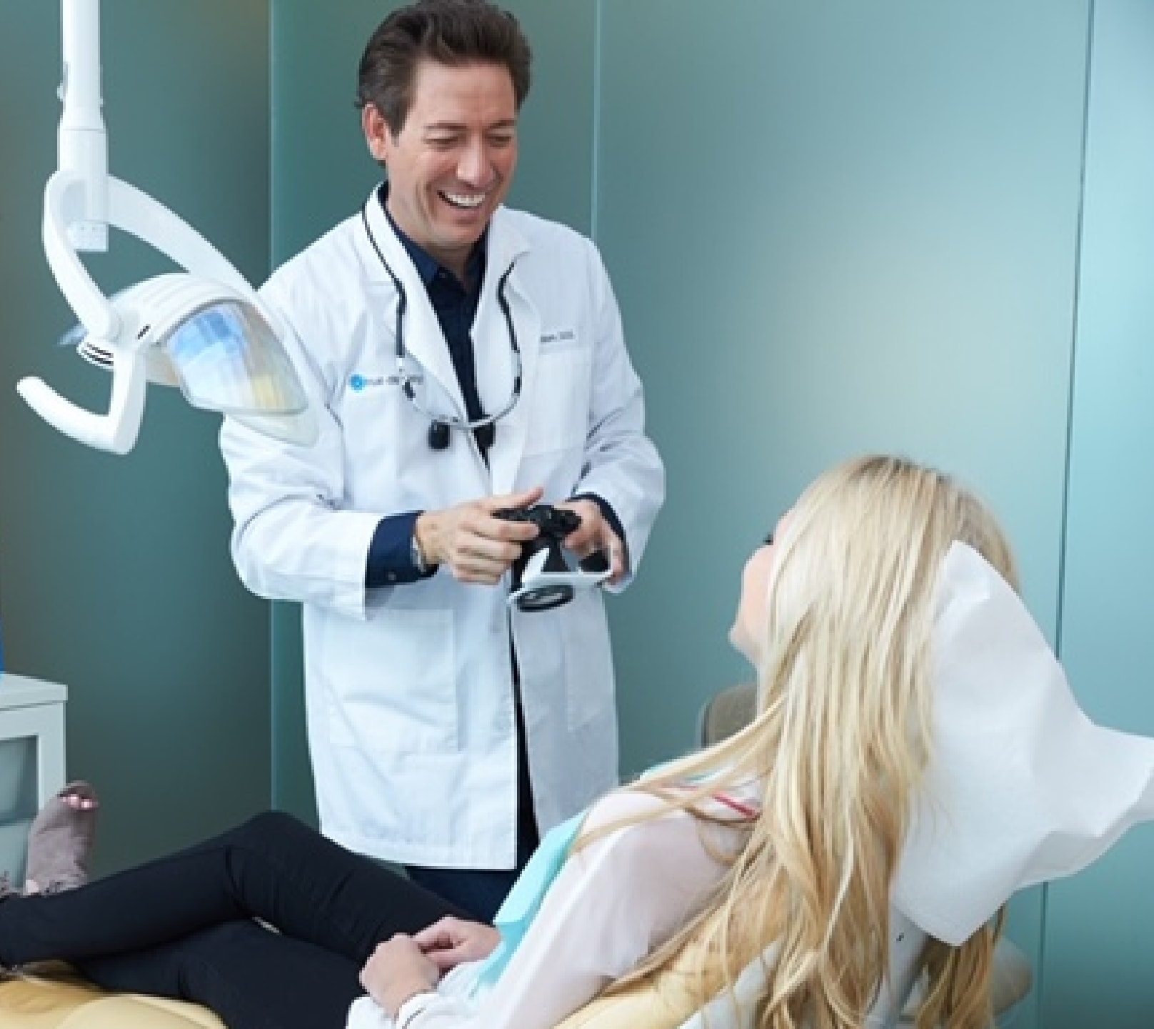 Dr. Joseph G. Willardsen talking to a patient